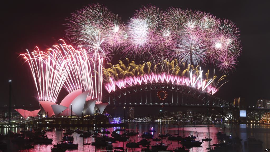Fireworks explode over the Opera House and the Harbour Bridge during New Years Eve celebrations in Sydney, Australia, Jan. 1, 2015. 