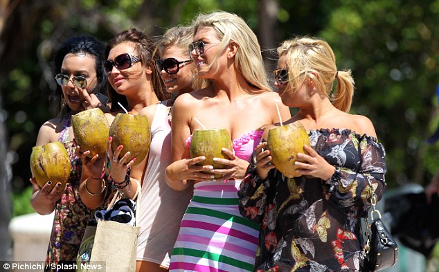 Girls on tour: Lauren (second left) and Frankie (second right) posed for a holiday snap with their girlfriends