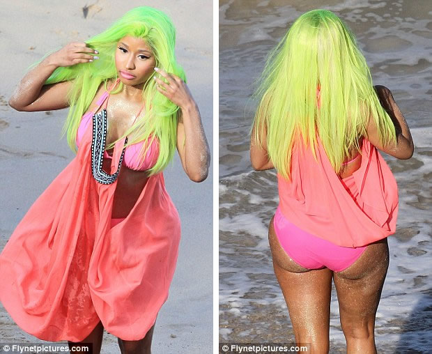 Do you need to shield your eyes from the brightness? Nicki moves her hair from her face
