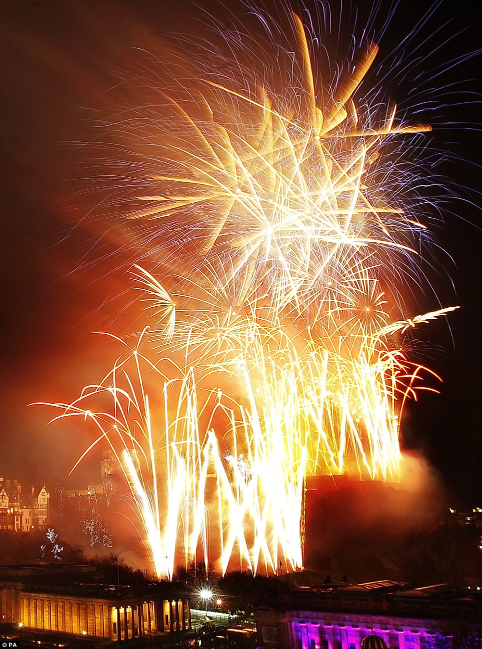 Stunning: Fireworks mark the new year during the 2013 Edinburgh Hogmanay celebrations in Scotland