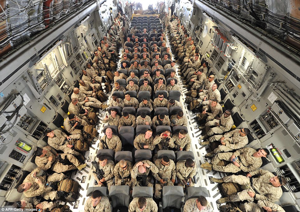 US servicemen inside of a plane before their departure to Afghanistan from the US transit center Manas, 30 km outside the Kyrgyzstan's capital Bishkek