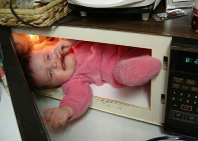 This is just frightening: And this poor little one doesn't look too pleased to be jammed in the microwave either