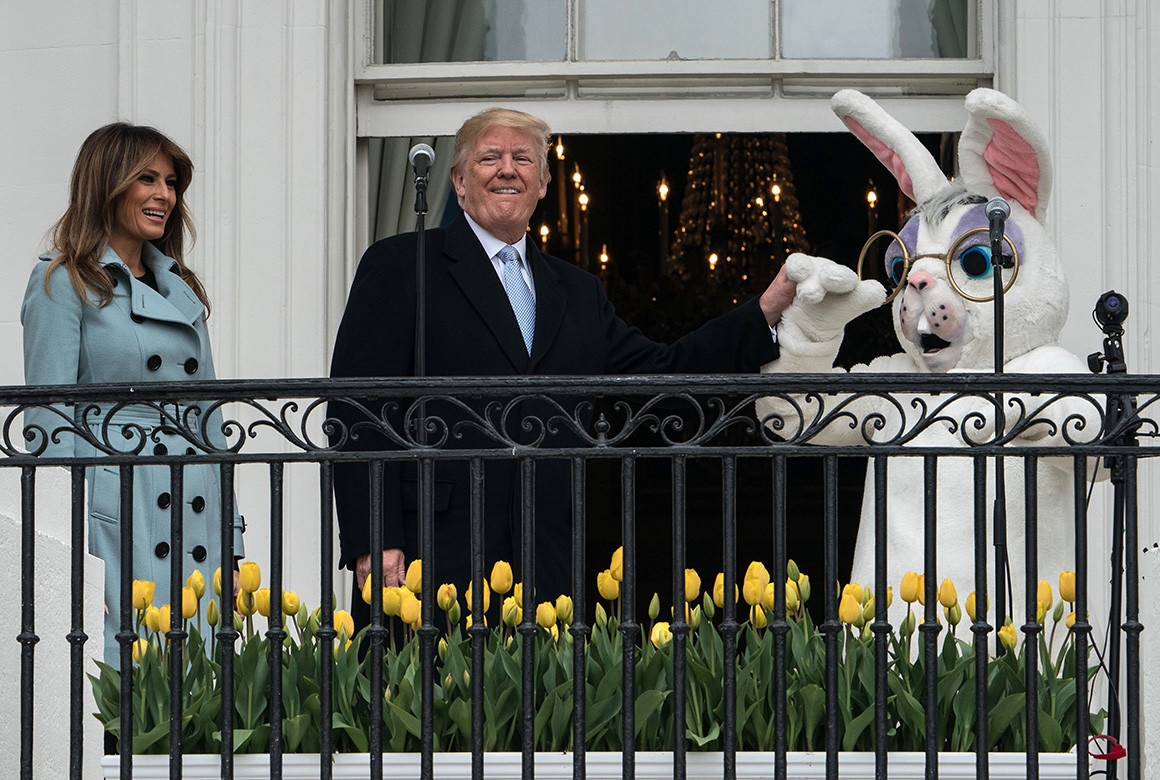 President Donald Trump and first lady Melania Trump welcome guests to the annual Easter Egg Roll on Monday.