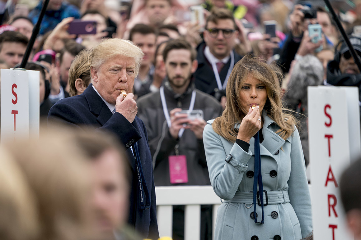 The Trumps blow whistles to start the Easter Egg Roll.