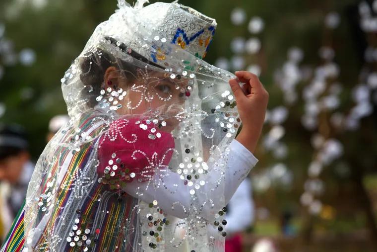 A girl dressed in traditional clothing during 'Navruz' celebrations in Khujand, Tajikistan.