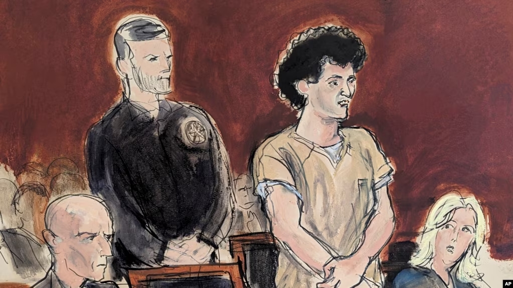 2024年3月28日,在这张法庭素描中,山姆·班克曼-弗里德(右二)在纽约曼哈顿联邦法院宣判时站着发表陈述。(美联社照片)