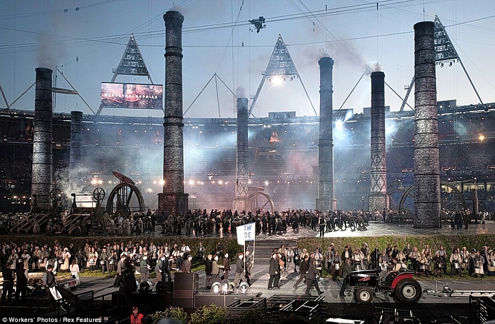 High-powered fans inflated the seven fabric chimneys, up to 100ft high, from trap doors in the stage