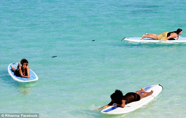 Fun with her pals: The singer was joined by friends as she relaxed on the sunshine break