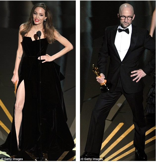 Mocking: After Angelina presented the award for Best Accepted Screenplay Award to The Descendants, writer Jim Rash couldn't resist poking fun at the hilarious pose