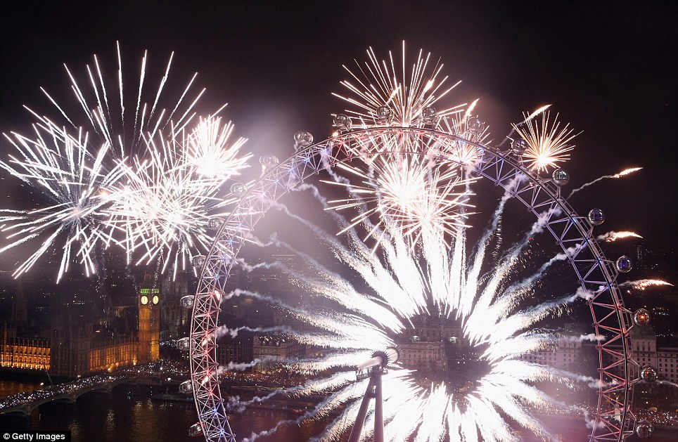 Popular: The banks of the River Thames near Parliament in central London were packed with thousands of happy revellers 