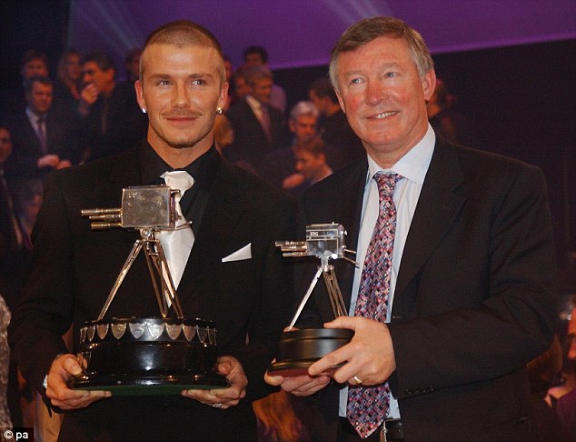Double top: Fergie, holding a Lifetime Achievement Award, with David Beckham, the winner of the BBC Sports Personality of the Year Award in 2001