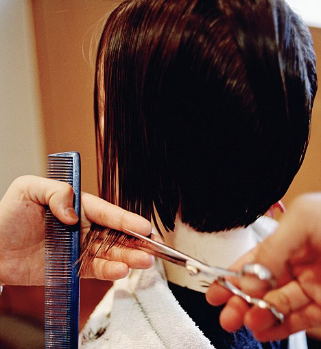 Another cut: The agreement between EU Coiffure, a group of European salon bosses, and UNI Europa Hair & Beauty would also see the number of haircuts staff can carry out restricted to prevent 'emotional collapses' 