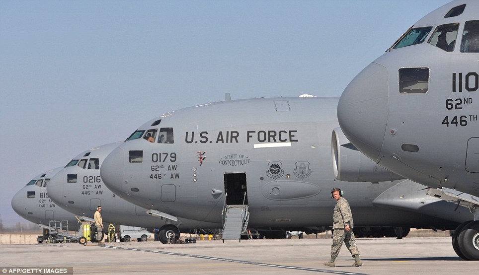 US servicemen perform their daily routines on the runway at the US transit center Manas, 30 km outside the Kyrgyzstan's capital Bishkek