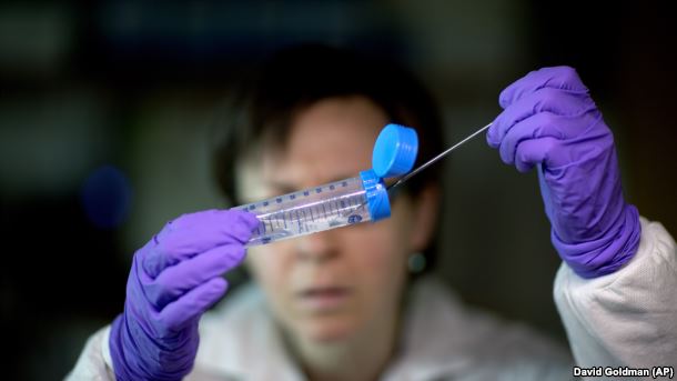 A graduated cylinder, or test tube (AP)
